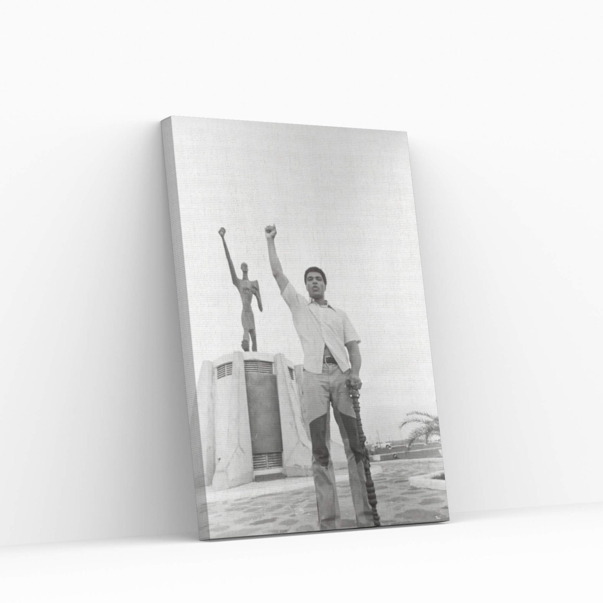 Muhammad Ali Posing In Front Of The Le Militant Statue, Kinshasa, Zaire Canvas Wall Art - Y Canvas