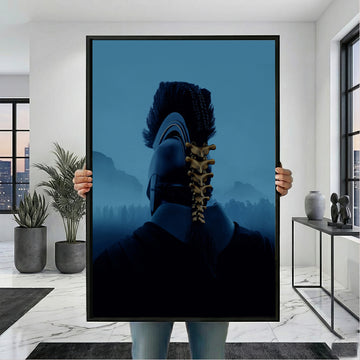 The Odyssey Ancient Warrior portrait in a black frame, held for scale
