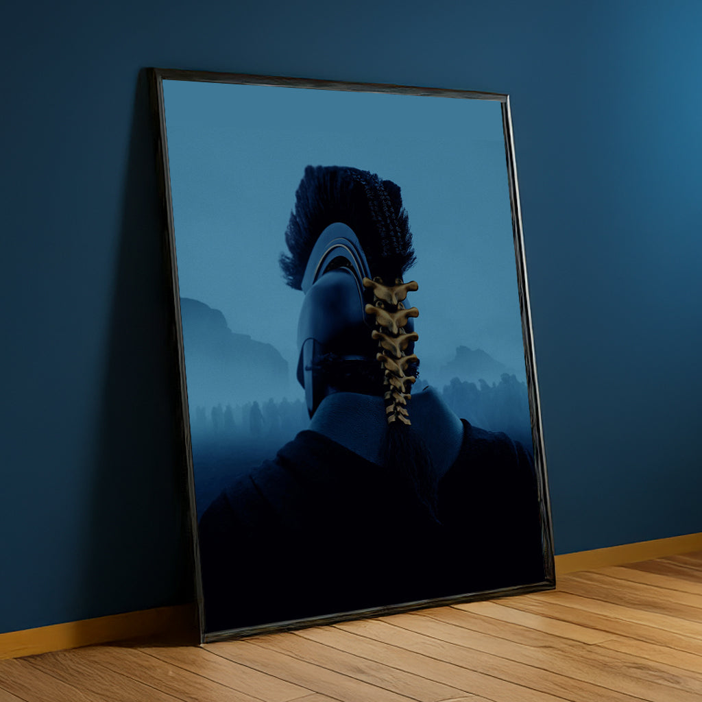The Odyssey Ancient Warrior black framed canvas against a blue wall