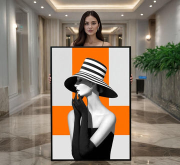 Image 1 of Modern Elegant Woman in Striped Hat Canvas Wall Art | Black and White with Orange Living Room Decor | Statement Piece